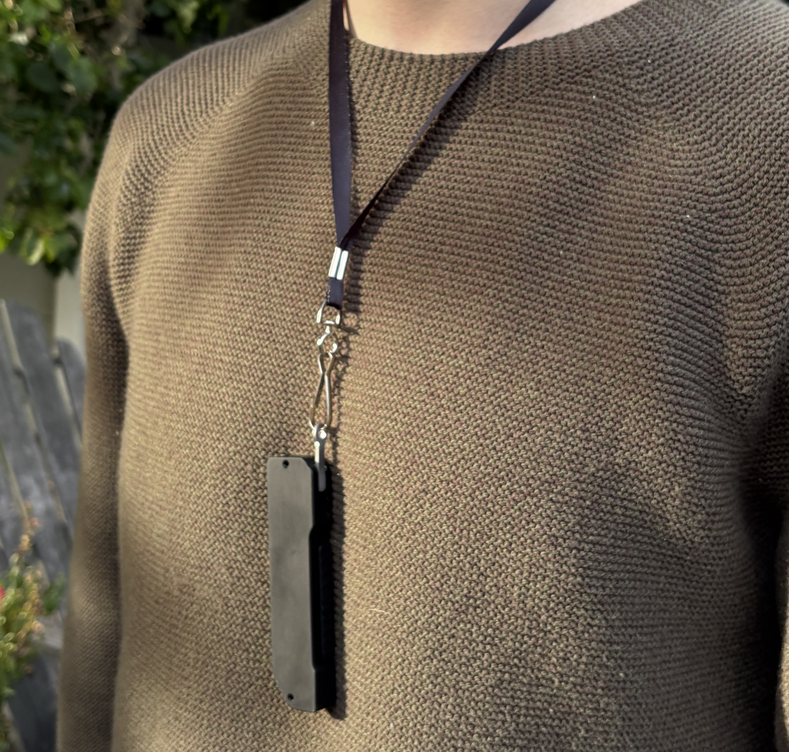 ExploraVist device worn on a lanyard
